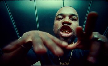 Movie still from “A$AP Ferg - Floor Seats” (2019), directed by Valentin Petit – Close Up shot, Overhead angle