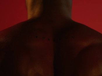 Movie still from “Kelsey Lu - Foreign Car” (2019), directed by Vincent Haycock – Extreme Close Up shot, Low angle