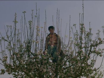 Movie still from “Kelsey Lu - Foreign Car” (2019), directed by Vincent Haycock – Wide shot, Low angle