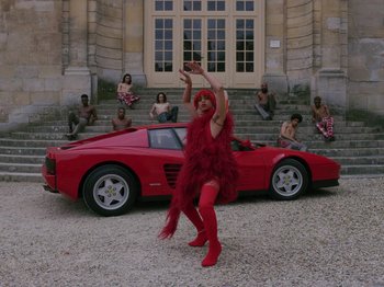 Movie still from “Kelsey Lu - Foreign Car” (2019), directed by Vincent Haycock – Wide shot, Low angle