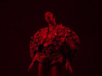Movie still from “Kelsey Lu - Foreign Car” (2019), directed by Vincent Haycock – Medium shot, Overhead angle