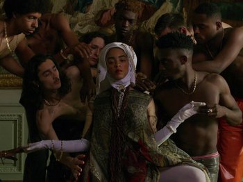 Movie still from “Kelsey Lu - Foreign Car” (2019), directed by Vincent Haycock – Medium shot, Low angle