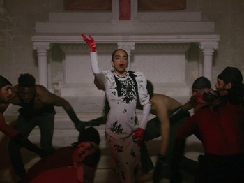 Movie still from “Kelsey Lu - Foreign Car” (2019), directed by Vincent Haycock – Medium shot, Low angle