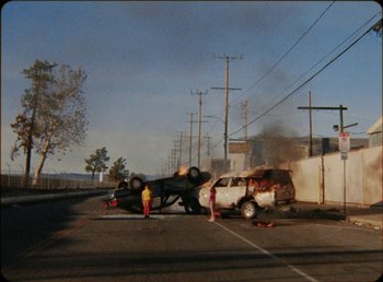 Movie still from “James Blake feat. Rosalía - Barefoot In The Park” (2019), directed by Diana Kunst – Extreme Wide shot, High angle