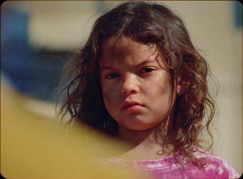 Movie still from “James Blake feat. Rosalía - Barefoot In The Park” (2019), directed by Diana Kunst – Close Up shot, High angle