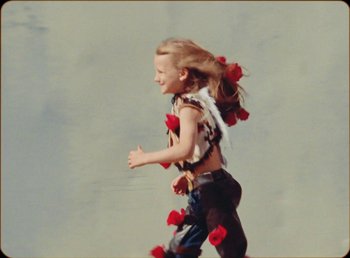 Movie still from “James Blake feat. Rosalía - Barefoot In The Park” (2019), directed by Diana Kunst – Wide shot, High angle