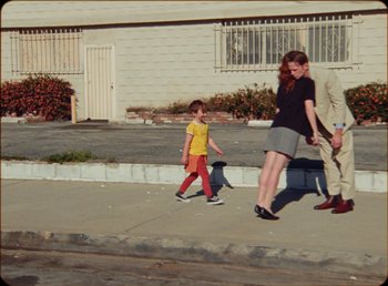 Movie still from “James Blake feat. Rosalía - Barefoot In The Park” (2019), directed by Diana Kunst – Wide shot, High angle
