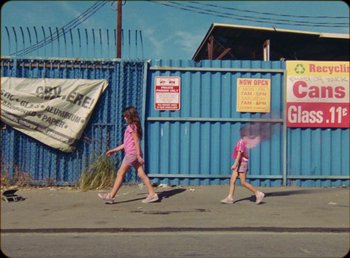 Movie still from “James Blake feat. Rosalía - Barefoot In The Park” (2019), directed by Diana Kunst – Wide shot, High angle