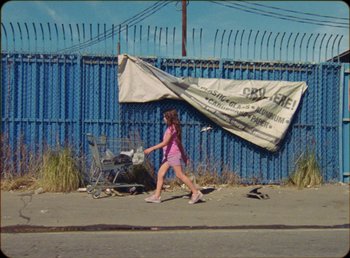 Movie still from “James Blake feat. Rosalía - Barefoot In The Park” (2019), directed by Diana Kunst – Wide shot, Low angle