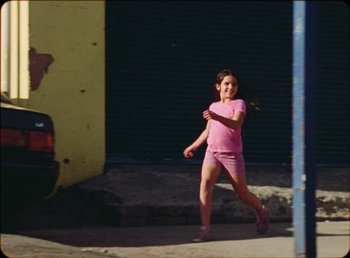 Movie still from “James Blake feat. Rosalía - Barefoot In The Park” (2019), directed by Diana Kunst – Wide shot, High angle