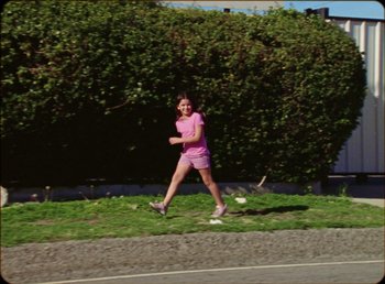 Movie still from “James Blake feat. Rosalía - Barefoot In The Park” (2019), directed by Diana Kunst – Wide shot, High angle