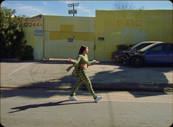 Movie still from “James Blake feat. Rosalía - Barefoot In The Park” (2019), directed by Diana Kunst – Wide shot, High angle