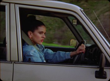 Movie still from “James Blake feat. Rosalía - Barefoot In The Park” (2019), directed by Diana Kunst – Close Up shot, High angle