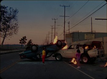 Movie still from “James Blake feat. Rosalía - Barefoot In The Park” (2019), directed by Diana Kunst – Extreme Wide shot, High angle