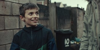 Movie still from “Mumford & Sons - Beloved” (2019), directed by Charlotte Regan – Close Up shot, Over the shoulder angle