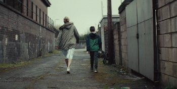 Movie still from “Mumford & Sons - Beloved” (2019), directed by Charlotte Regan – Wide shot, Over the shoulder angle