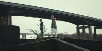 Movie still from “Mumford & Sons - Beloved” (2019), directed by Charlotte Regan – Wide shot, Low angle