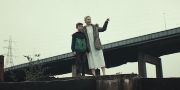 Movie still from “Mumford & Sons - Beloved” (2019), directed by Charlotte Regan – Wide shot, Low angle