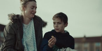 Movie still from “Mumford & Sons - Beloved” (2019), directed by Charlotte Regan – Close Up shot, Over the shoulder angle