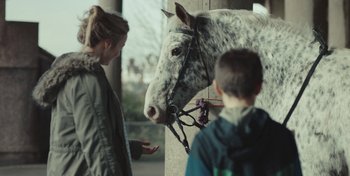 Movie still from “Mumford & Sons - Beloved” (2019), directed by Charlotte Regan – Close Up shot, Over the shoulder angle