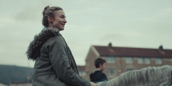 Movie still from “Mumford & Sons - Beloved” (2019), directed by Charlotte Regan – Close Up shot, Over the shoulder angle