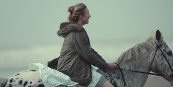 Movie still from “Mumford & Sons - Beloved” (2019), directed by Charlotte Regan – Medium shot, Over the shoulder angle