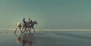 Movie still from “Mumford & Sons - Beloved” (2019), directed by Charlotte Regan – Extreme Wide shot, Low angle
