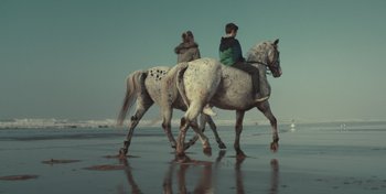Movie still from “Mumford & Sons - Beloved” (2019), directed by Charlotte Regan – Wide shot, Low angle