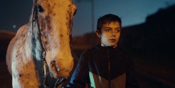 Movie still from “Mumford & Sons - Beloved” (2019), directed by Charlotte Regan – Close Up shot, Low angle