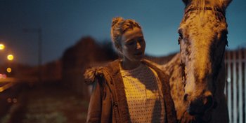 Movie still from “Mumford & Sons - Beloved” (2019), directed by Charlotte Regan – Close Up shot, Over the shoulder angle