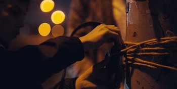 Movie still from “Mumford & Sons - Beloved” (2019), directed by Charlotte Regan – Extreme Close Up shot, Low angle