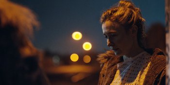 Movie still from “Mumford & Sons - Beloved” (2019), directed by Charlotte Regan – Close Up shot, Over the shoulder angle