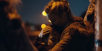 Movie still from “Mumford & Sons - Beloved” (2019), directed by Charlotte Regan – Close Up shot, Over the shoulder angle