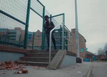 Movie still from “Adelphi Music Factory - Javelin (Calling Out Your Name)” (2019), directed by Fanny Hoetzeneder – Wide shot, Low angle