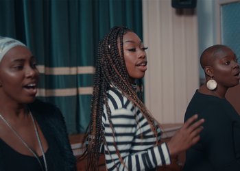 Movie still from “Adelphi Music Factory - Javelin (Calling Out Your Name)” (2019), directed by Fanny Hoetzeneder – Medium shot, Over the shoulder angle