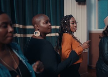 Movie still from “Adelphi Music Factory - Javelin (Calling Out Your Name)” (2019), directed by Fanny Hoetzeneder – Medium shot, Over the shoulder angle