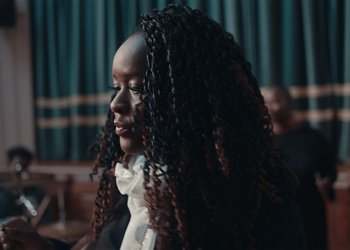 Movie still from “Adelphi Music Factory - Javelin (Calling Out Your Name)” (2019), directed by Fanny Hoetzeneder – Close Up shot, Over the shoulder angle