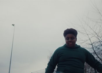 Movie still from “Adelphi Music Factory - Javelin (Calling Out Your Name)” (2019), directed by Fanny Hoetzeneder – Medium shot, Low angle