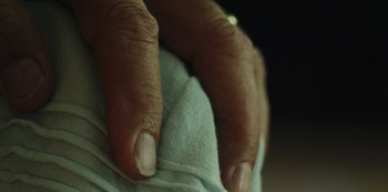 Movie still from “LCD Soundsystem - Oh Baby” (2019), directed by Rian Johnson – Extreme Close Up shot, Overhead angle