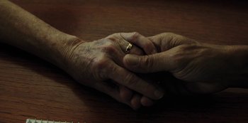 Movie still from “LCD Soundsystem - Oh Baby” (2019), directed by Rian Johnson – Extreme Close Up shot, Overhead angle