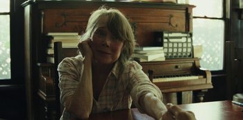 Movie still from “LCD Soundsystem - Oh Baby” (2019), directed by Rian Johnson – Close Up shot, Over the shoulder angle