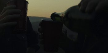 Movie still from “LCD Soundsystem - Oh Baby” (2019), directed by Rian Johnson – Extreme Close Up shot, Low angle