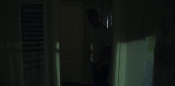 Movie still from “LCD Soundsystem - Oh Baby” (2019), directed by Rian Johnson – Medium shot, Low angle