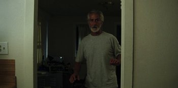 Movie still from “LCD Soundsystem - Oh Baby” (2019), directed by Rian Johnson – Medium shot, Low angle