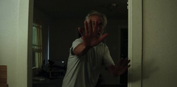 Movie still from “LCD Soundsystem - Oh Baby” (2019), directed by Rian Johnson – Medium shot, Low angle