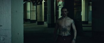 Movie still from “Hozier - Movement” (2018), directed by Us – Medium shot, Low angle