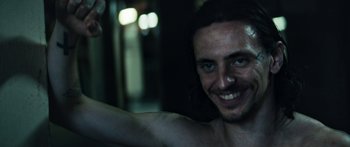 Movie still from “Hozier - Movement” (2018), directed by Us – Close Up shot, Low angle