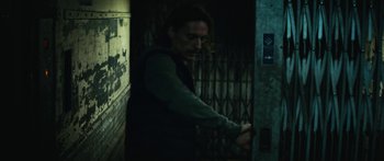 Movie still from “Hozier - Movement” (2018), directed by Us – Medium shot, Low angle