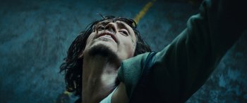 Movie still from “Hozier - Movement” (2018), directed by Us – Close Up shot, Low angle