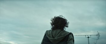 Movie still from “Hozier - Movement” (2018), directed by Us – Close Up shot, Low angle